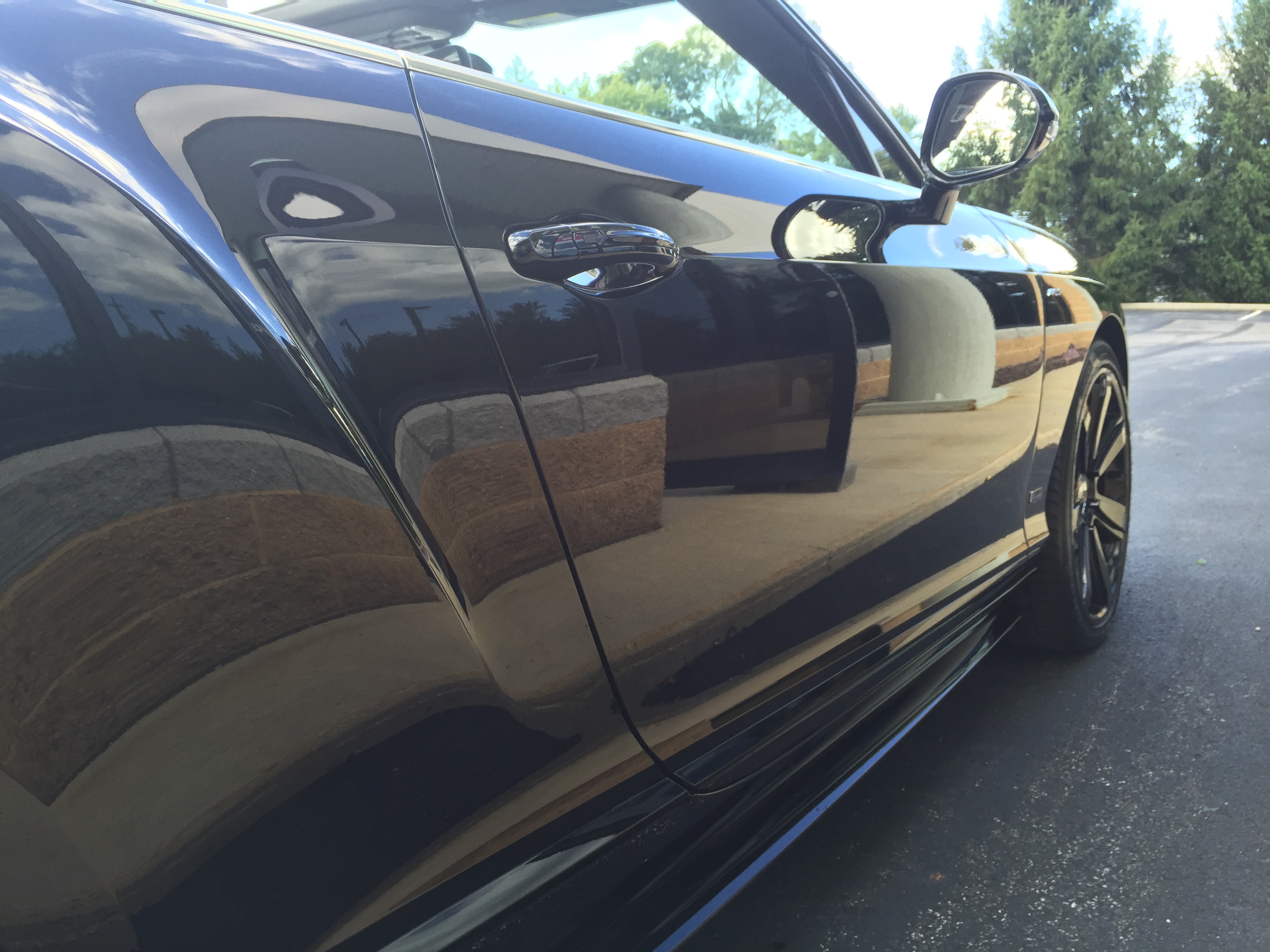 Bentley Continental GT — flawless side panel reflection after full detail