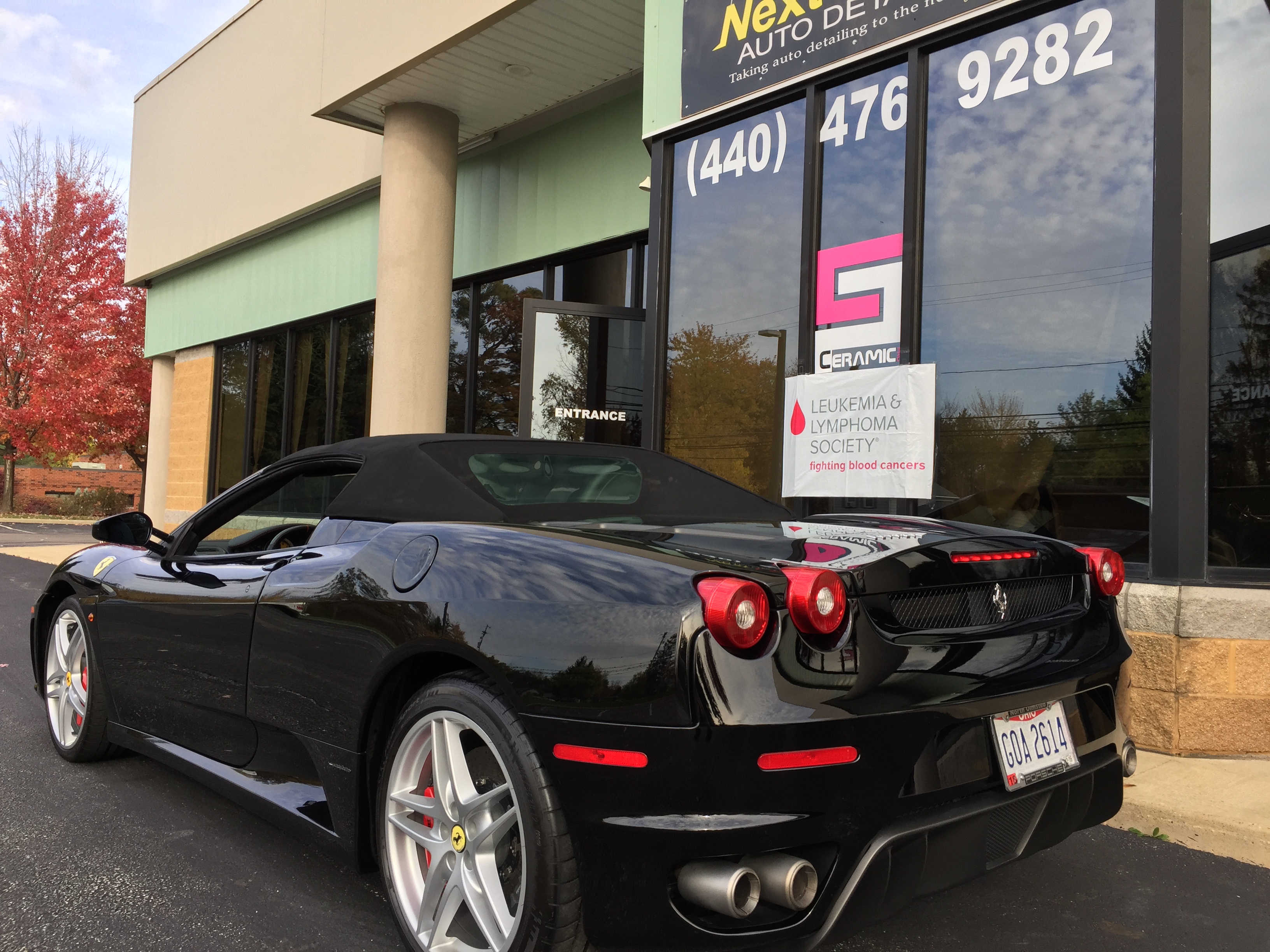 Ferrari F430 Spider — rear view with quad taillights at the shop
