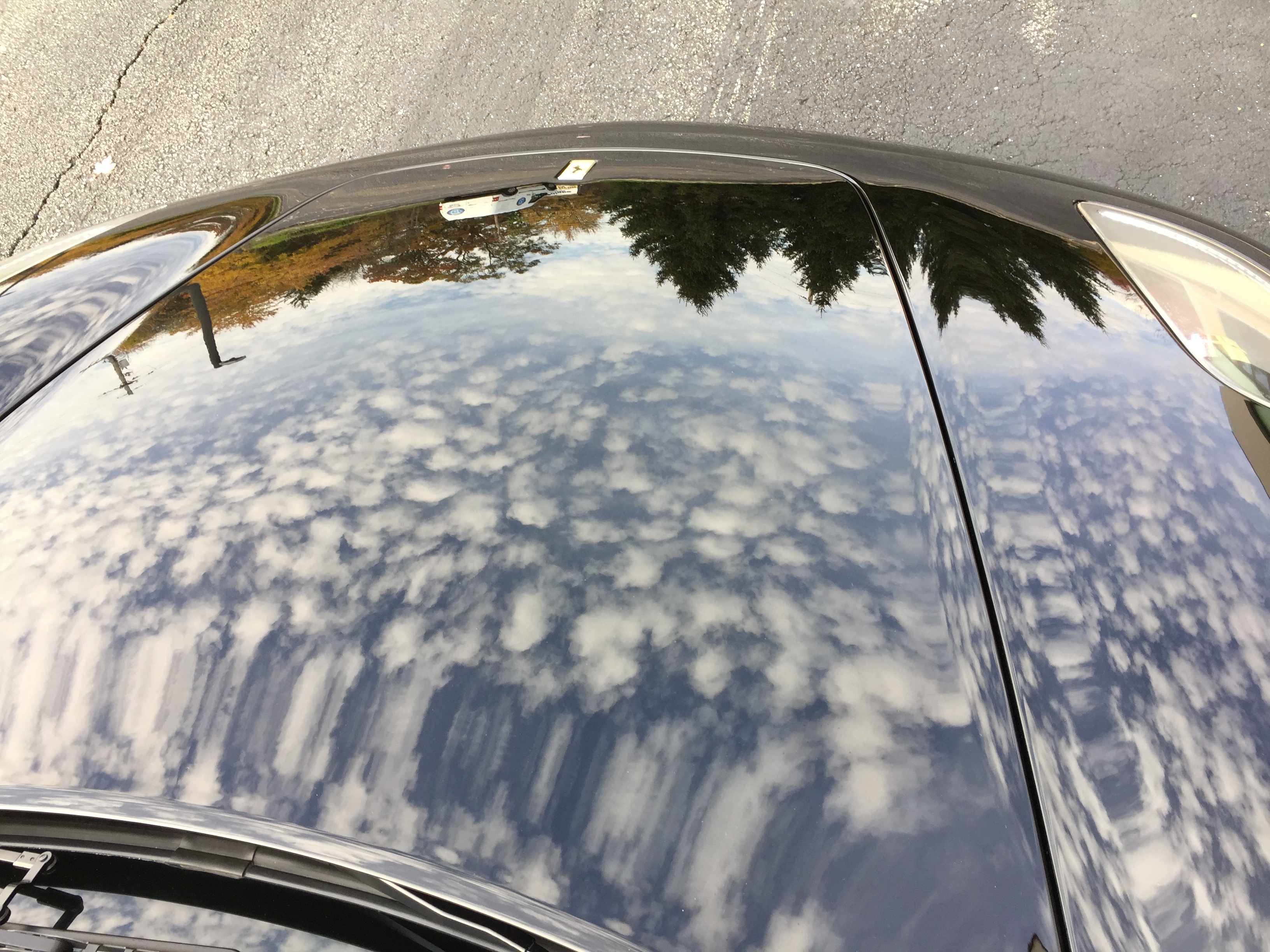 Ferrari F430 — sky reflections in flawless ceramic-coated paint