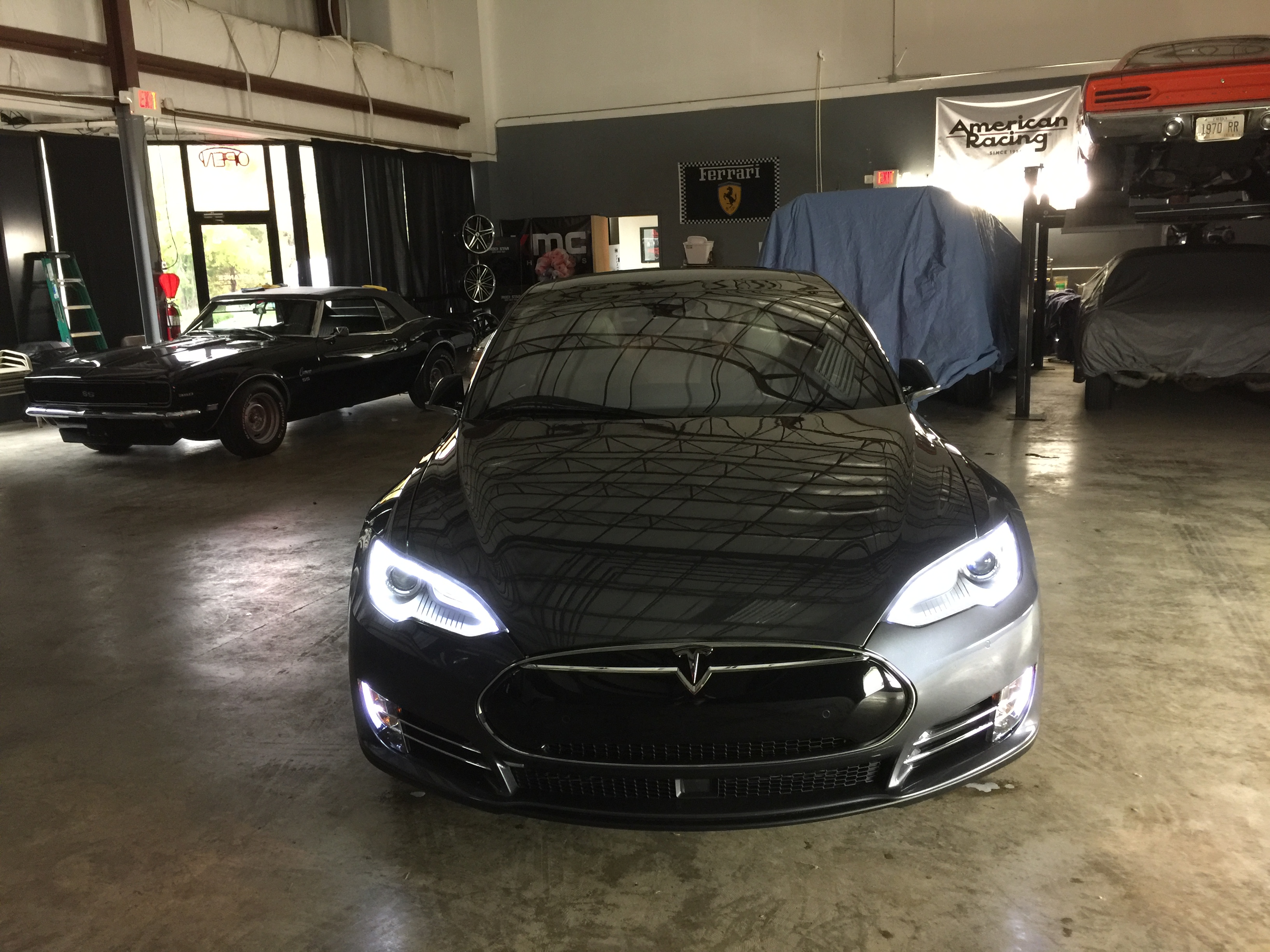 Tesla Model S — ceramic coating and window tint at the shop